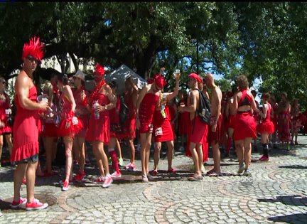 Red Dress Run participants fill the French Quarter