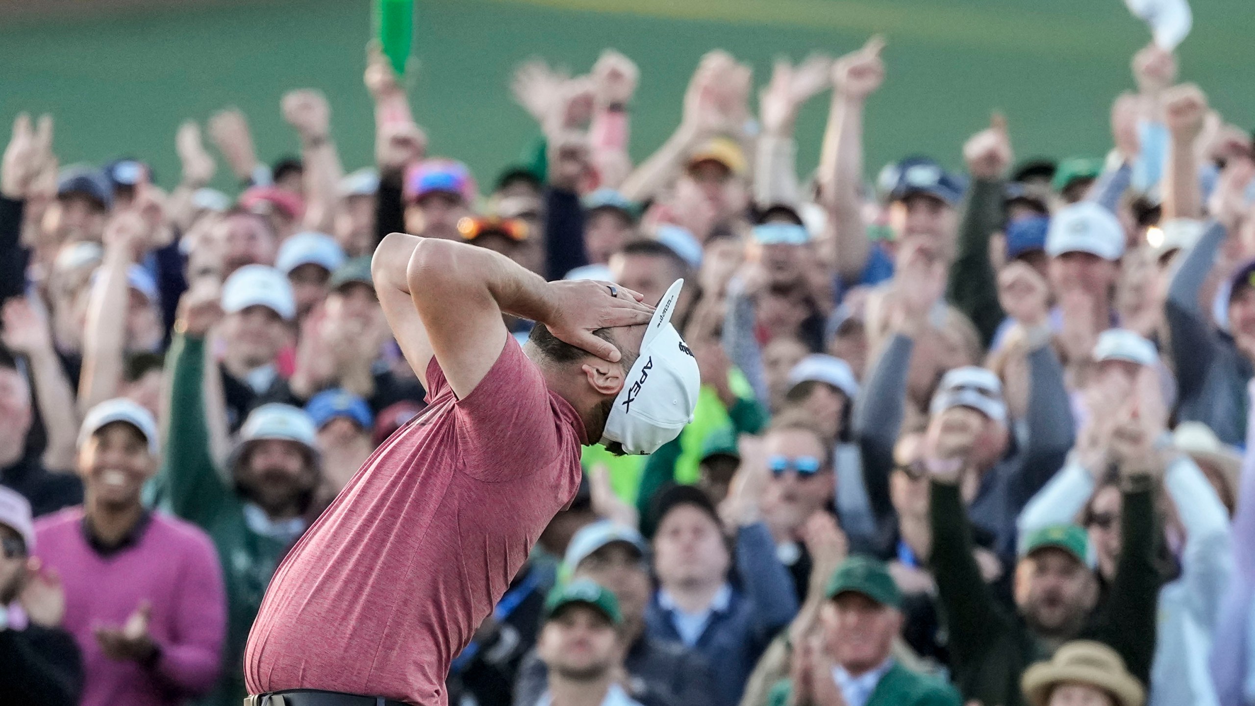 Jon Rahm, of Spain, celebrates on the 18th green after wining the Masters golf tournament at Augusta National Golf Club on Sunday, April 9, 2023, in Augusta, Ga. (AP Photo/Jae C. Hong)