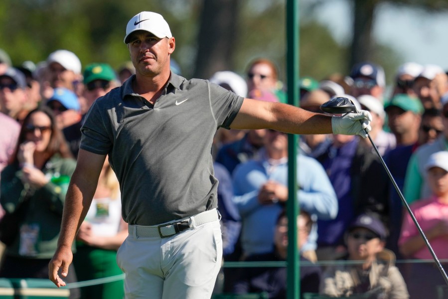 Brooks Koepka watches his tee shot on the eighth hole during the final round of the Masters golf tournament at Augusta National Golf Club on Sunday, April 9, 2023, in Augusta, Ga. (AP Photo/Mark Baker)