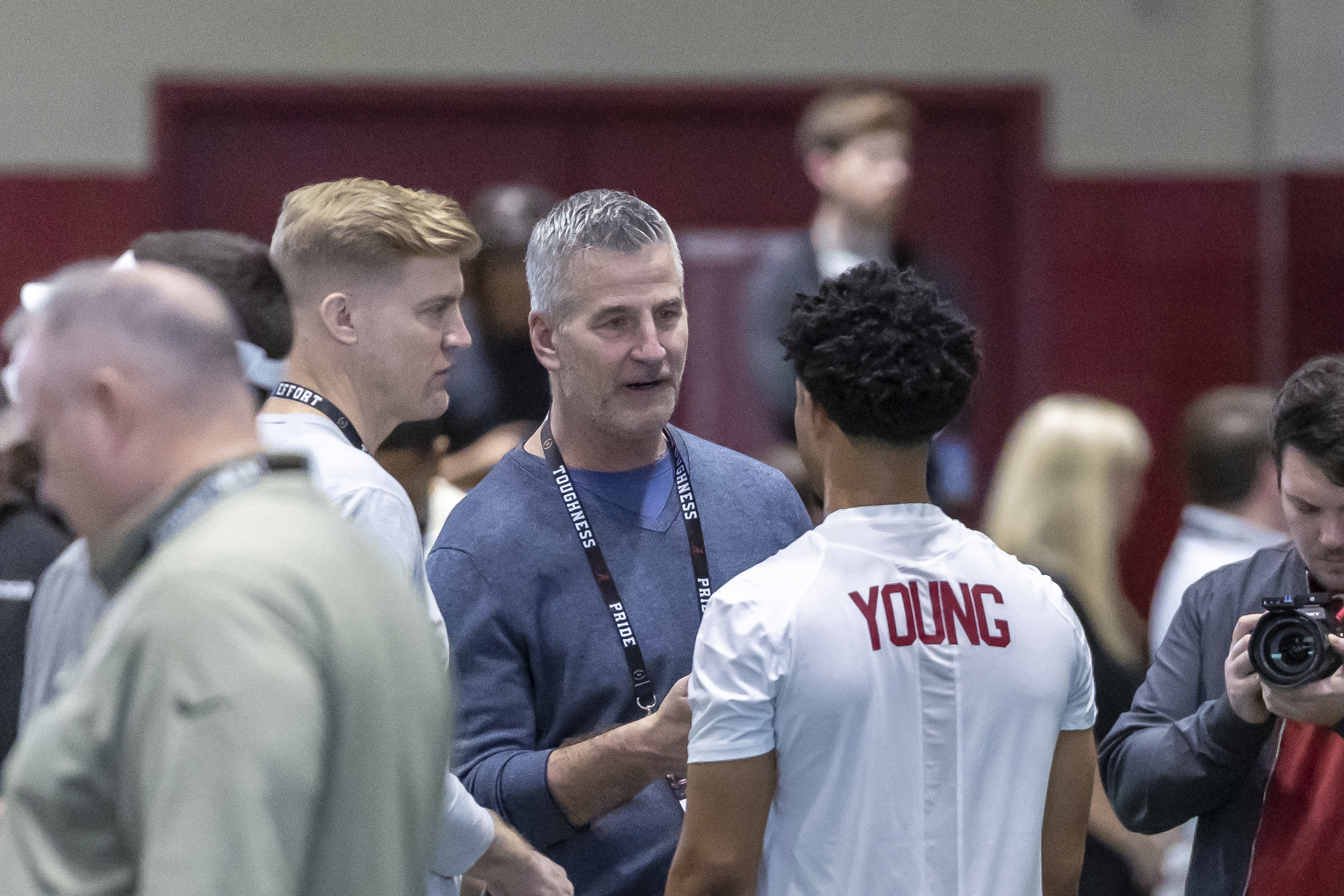 FILE - Carolina Panthers head football coach Frank Reich talks with former Alabama quarterback Bryce Young at Alabama's NFL pro day, Thursday, March 23, 2023, in Tuscaloosa, Ala. The Panthers packaged two first-round picks, two second-round picks and star receiver D.J. Moore to move up from No. 9 in the draft to the top pick to give Carolina the pick of the lot at quarterback in next week's draft. (AP Photo/Vasha Hunt, File)