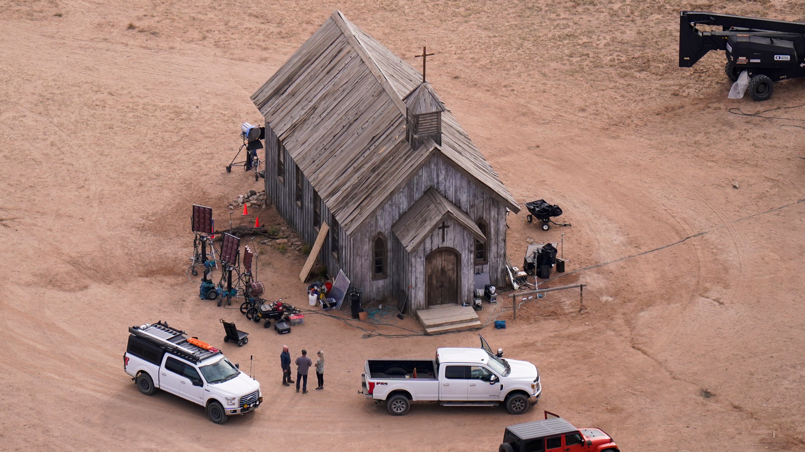 FILE - This aerial photo shows the movie set of "Rust" at Bonanza Creek Ranch in Santa Fe, N.M., on Saturday, Oct. 23, 2021. Prosecutors in New Mexico plan to drop an involuntary manslaughter charge against Alec Baldwin in the fatal 2021 shooting of a cinematographer on the set of the Western film “Rust.” Baldwin’s attorneys said in a statement Thursday that they are pleased with the decision to dismiss the case. (AP Photo/Jae C. Hong, File)