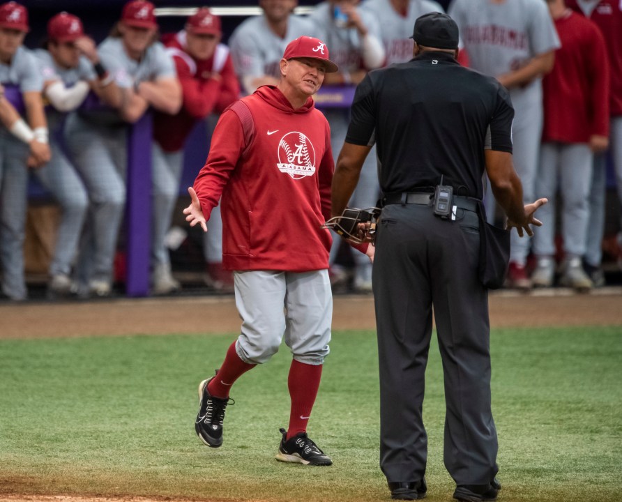 Alabama head coach Brad Bohannon, left, argues with umpire Joe Harris after being tossed from an NCAA college baseball game in the bottom of the second inning against LSU, Saturday, April 29, 2023, in Baton Rouge, Louisiana./The Advocate via AP)