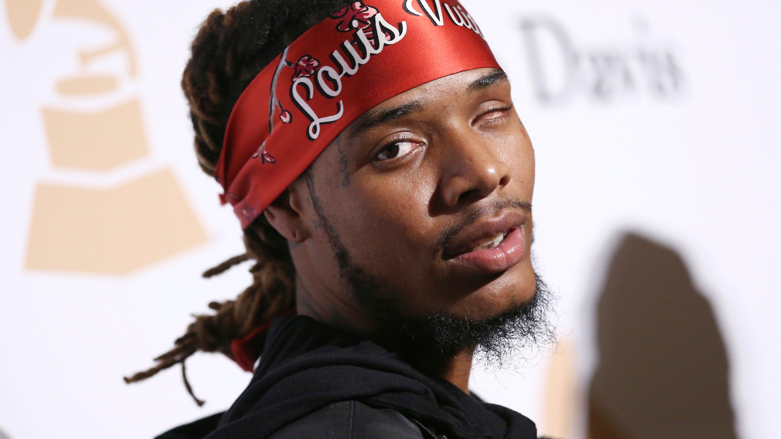 FILE - Fetty Wap arrives at the 2016 Clive Davis Pre-Grammy Gala at the Beverly Hilton Hotel, Feb. 14, 2016, in Beverly Hills, Calif. Rapper Fetty Wap has been sentenced to six years in federal prison on Wednesday, May 24, 2023, for his role in a New York-based drug-trafficking scheme. (Photo by John Salangsang/Invision/AP, File)