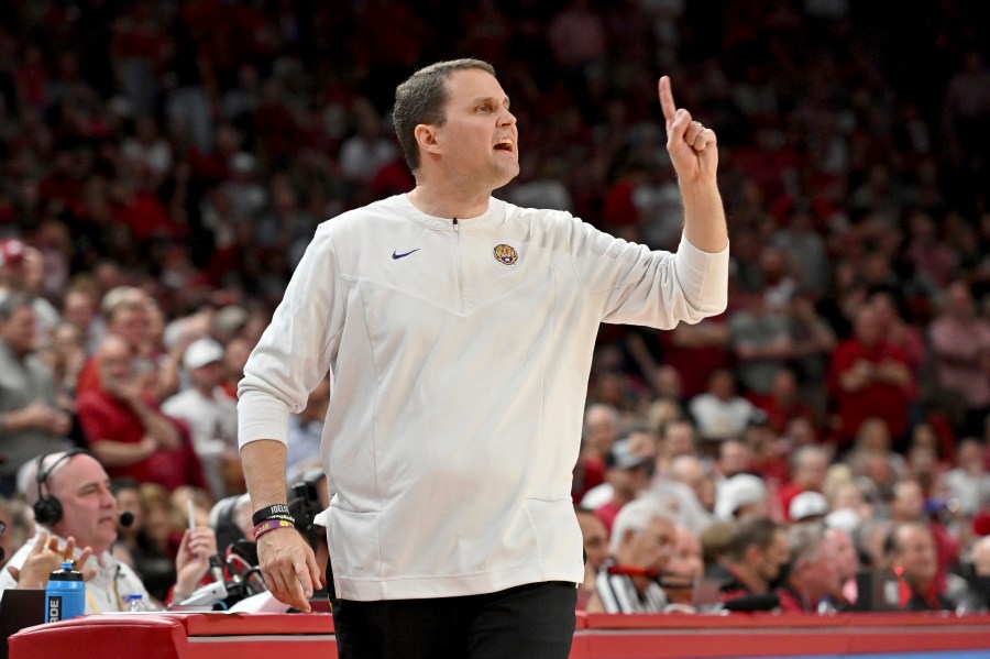 FILE - Then-LSU coach Will Wade gestures during the first half of an NCAA college basketball game against Arkansas, Wednesday, March 2, 2022, in Fayetteville, Ark. An independent infractions panel handed a two-year show-cause penalty and a 10-game suspension to former LSU and current McNeese State men's basketball coach Will Wade on Thursday, June 22, 2023, for multiple rules violations. (AP Photo/Michael Woods, File)