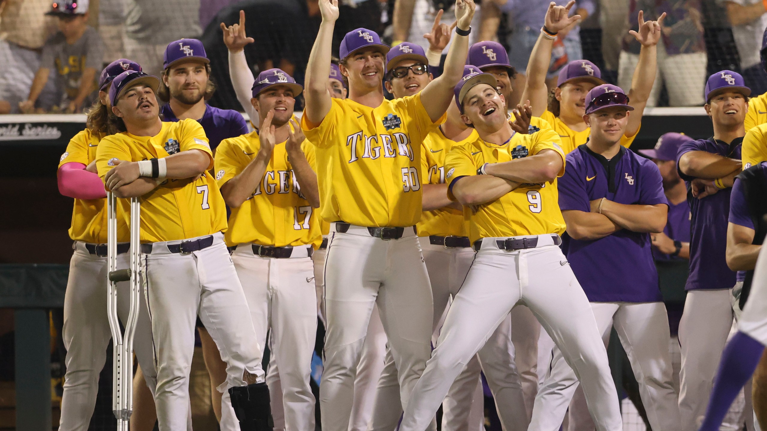 LSU's Brayden Jobert (6) is greeted after his 2-run homer in the 9th inning of Game 3 of the NCAA College World Series baseball finals against Florida in Omaha, Neb., Monday, June 26, 2023. (AP Photo/Rebecca S. Gratz)