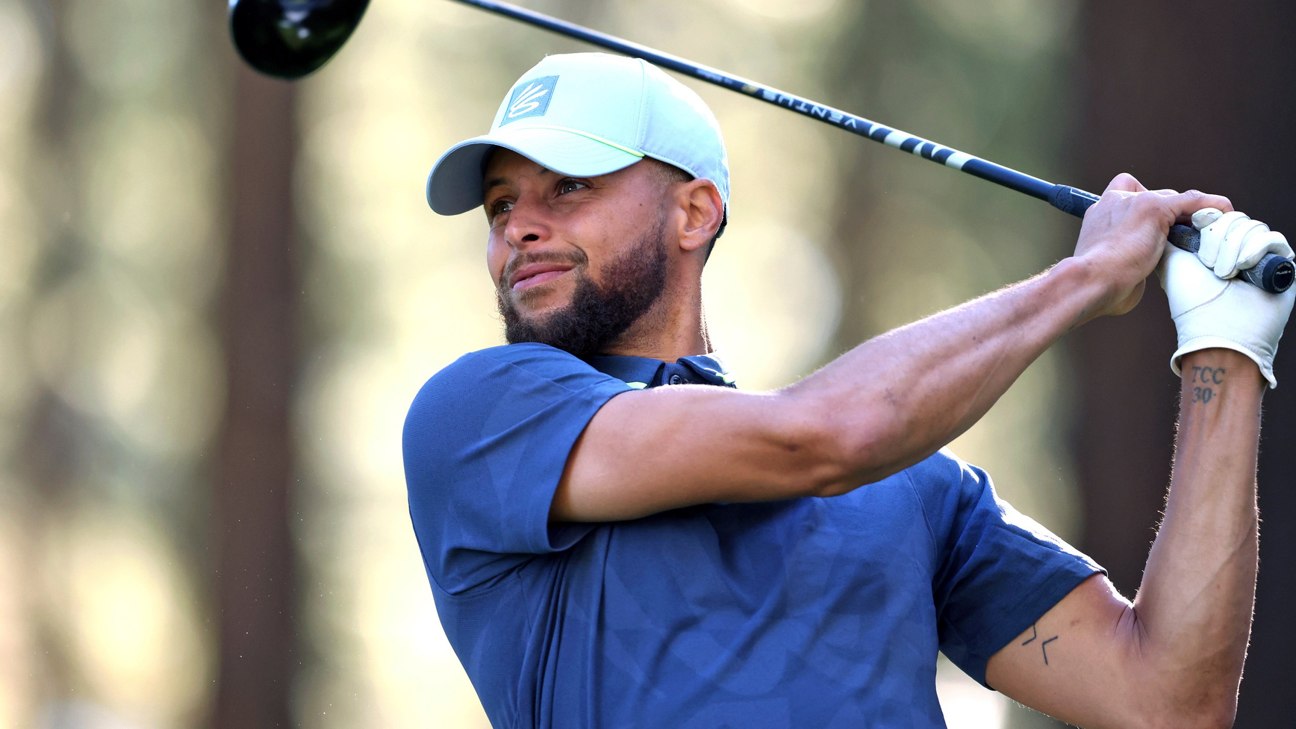 Stephen Curry watches a tee shot on the 16th hole during a practice round at American Century Championship golf tournament Wednesday, July 12, 2023, in Stateline, Nev. (Scott Strazzante/San Francisco Chronicle via AP)