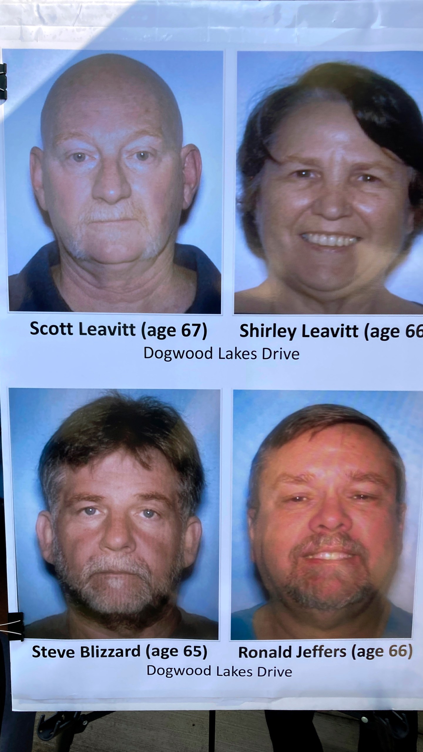 Pictures identifying the four people shot and killed in Saturday's shooting near Atlanta are displayed by officers, Sunday, July 16, 2023, in Hampton, Ga. (AP Photo/Jeff Amy)