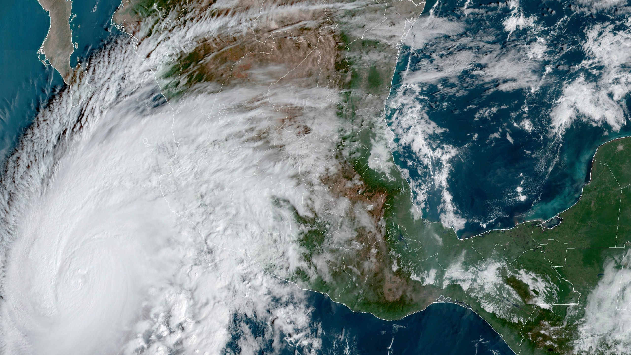 This satellite image provided by NOAA on Thursday, Oct. 19, 2023, shows Hurricane Storm Norma approaching the southern tip of the Baja California peninsula on Mexico's Pacific coast. (NOAA via AP)