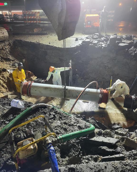 Crews work to repair a broken water line in Jefferson Parish