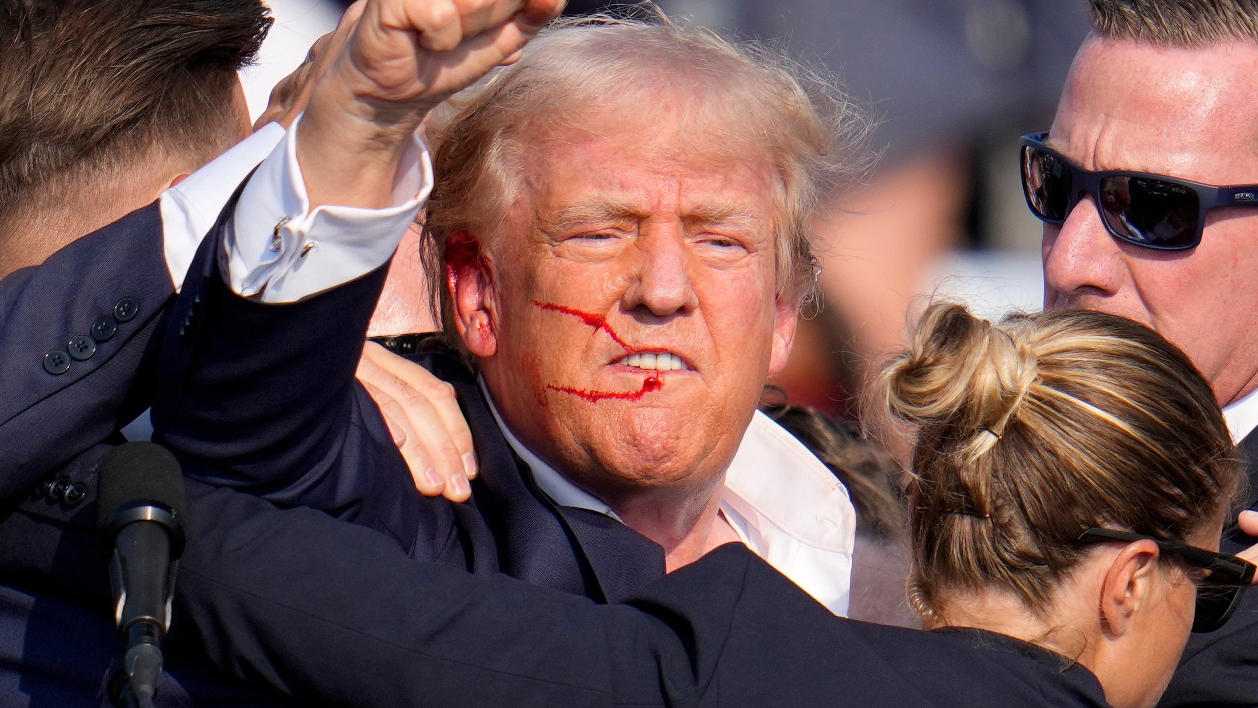 FILE - Republican presidential candidate former President Donald Trump reacts following an assassination attempt at a campaign event in Butler, Pa., on Saturday, July 13, 2024. Trump Media surged in the first day of trading, Monday, July 15, following the assassination attempt. (AP Photo/Gene J. Puskar, File)