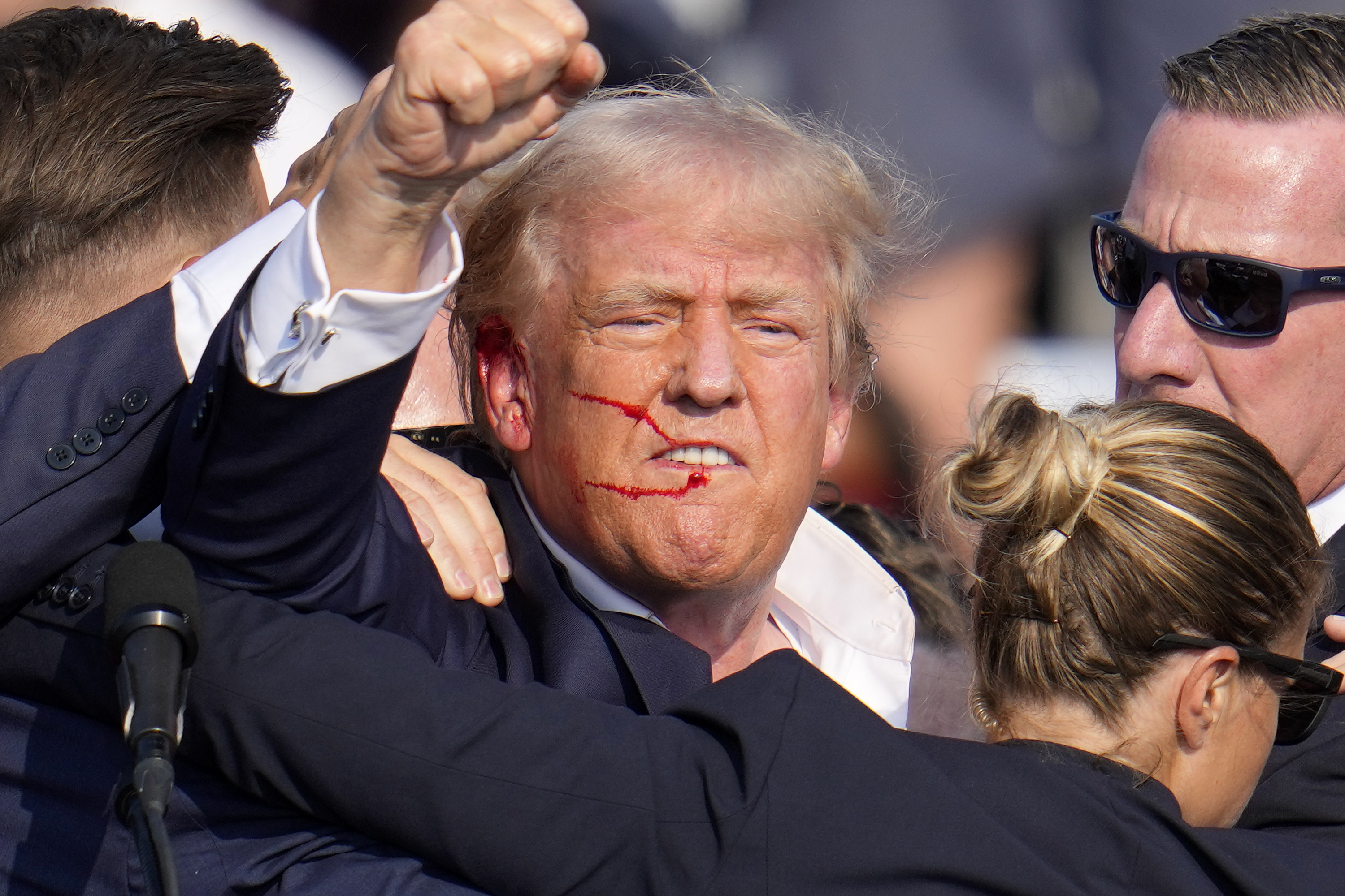 FILE - Republican presidential candidate former President Donald Trump reacts following an assassination attempt at a campaign event in Butler, Pa., on Saturday, July 13, 2024. Trump Media surged in the first day of trading, Monday, July 15, following the assassination attempt. (AP Photo/Gene J. Puskar, File)