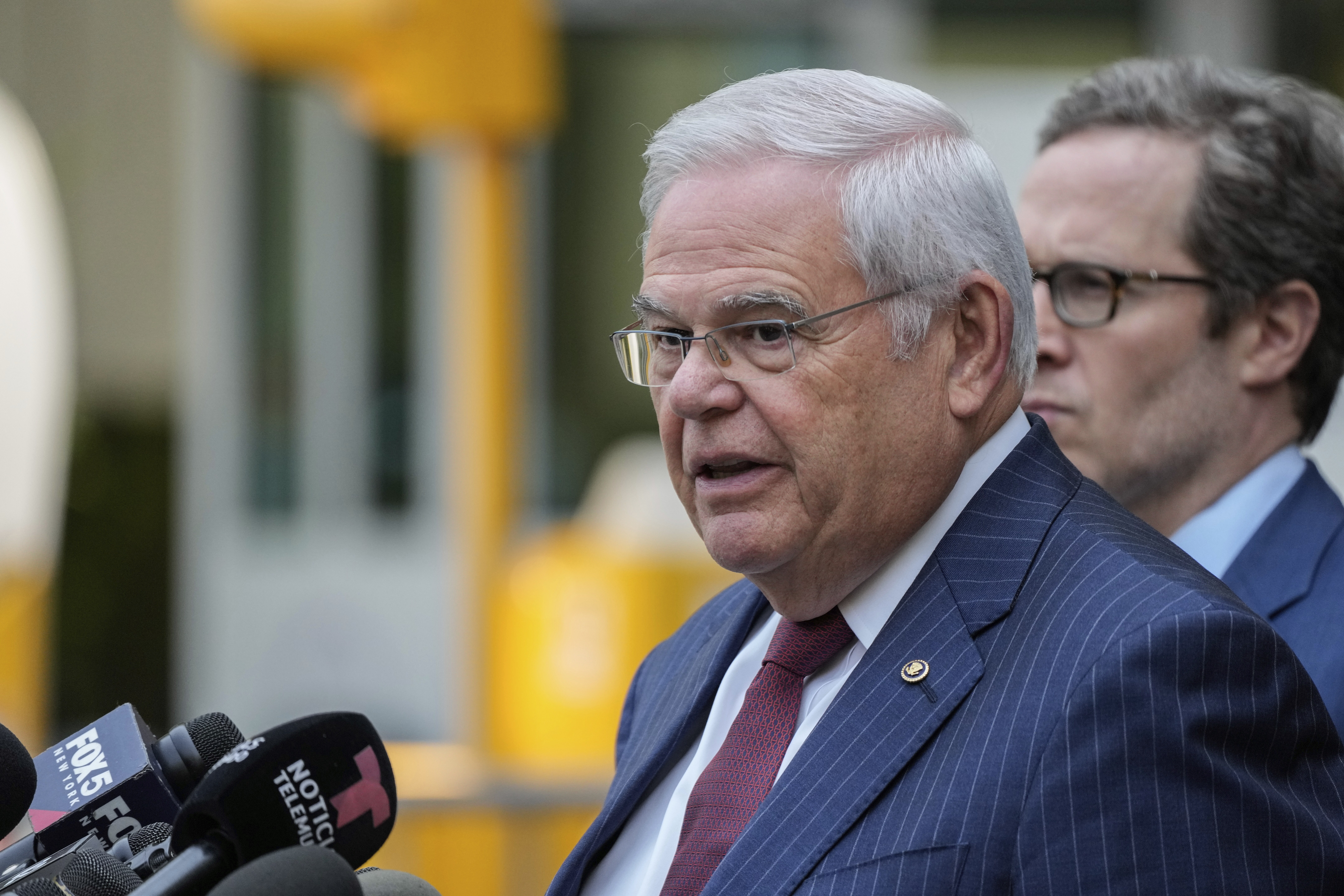 Sen. Bob Menendez, D-N.J., speaks to the media outside federal court, Tuesday, July 16, 2024, in New York. Menendez has been convicted of all the charges he faced at his corruption trial, including accepting bribes of gold and cash from three New Jersey businessmen and acting as a foreign agent for the Egyptian government. (AP Photo/Frank Franklin II)