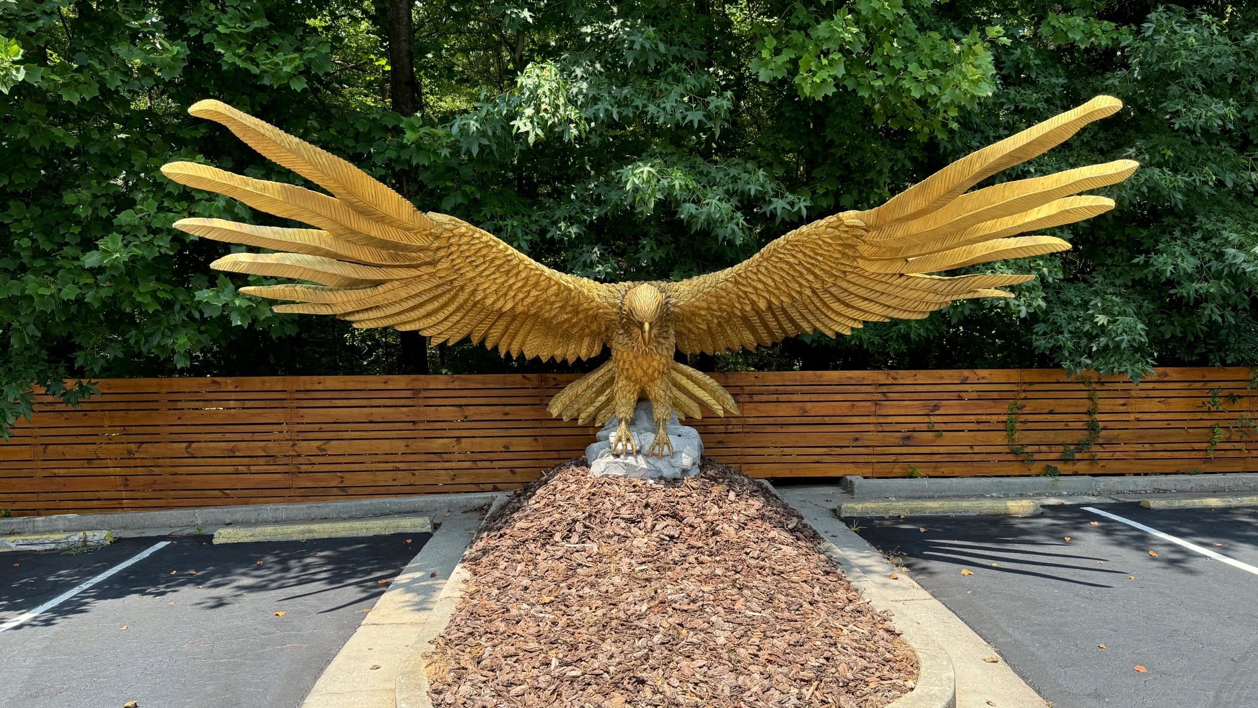 A hawk statue from Francis Ford Coppola's film "Megalopolis" in the parking lot of Coppola's The All-Movie Hotel shown on Monday, July 15, 2024, in Peachtree City, Ga. The hotel is a mixed-use property for production companies and tourists excited about film. (AP Photo/Charlotte Kramon)