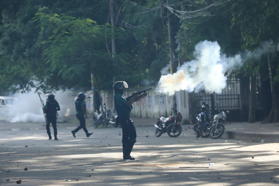 Police fire tear gas shells and rubber bullets to disperse students shouting slogans in favor of quota system in public service at the university campus, in Dhaka, Bangladesh, Wednesday, July 17, 2024. (AP Photo/Rajib Dhar)